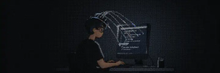 A person at a computer at night. Lines of light run from their head into the monitor, and code types out on the screen as the data arrives.